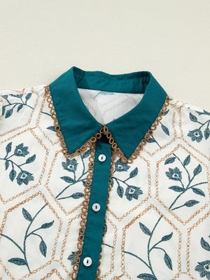 Floral print cotton mini dress with a teal polo collar and button front.