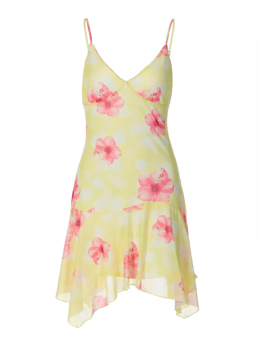 Yellow floral asymmetrical mini dress with ruffled hem and polka dots.