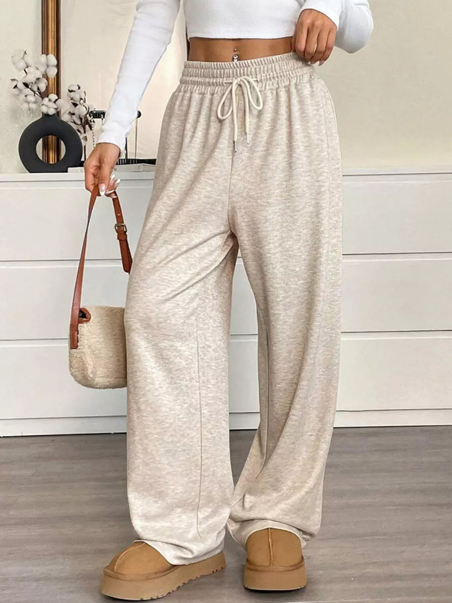 wide-leg pants in Black with drawstring waist and full-length