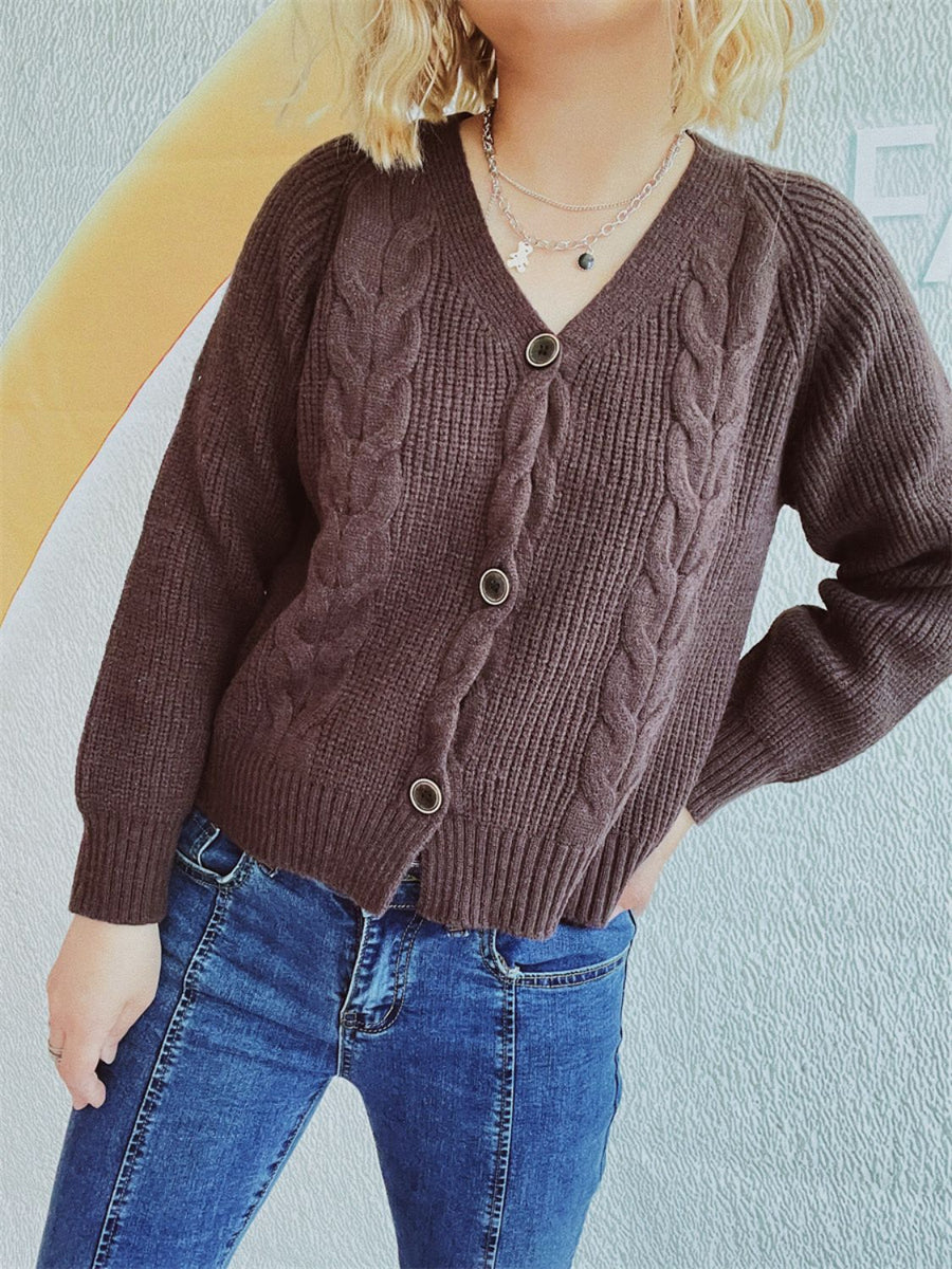 Brown cable knit raglan cardigan with V-neck and button front.
