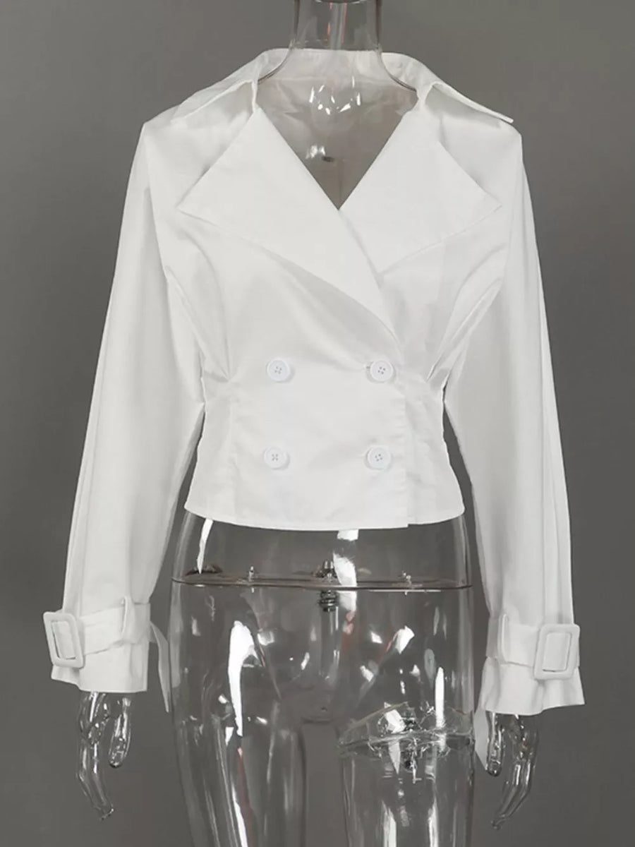 white blazer with buttoned cuffs and long sleeve