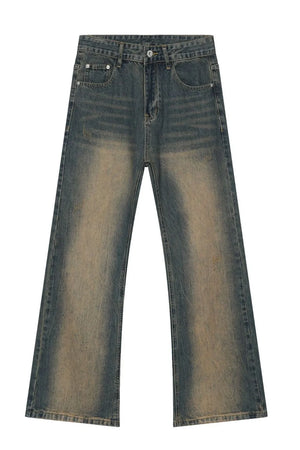 Faded wash bootcut denim jeans in medium color with a distressed look.