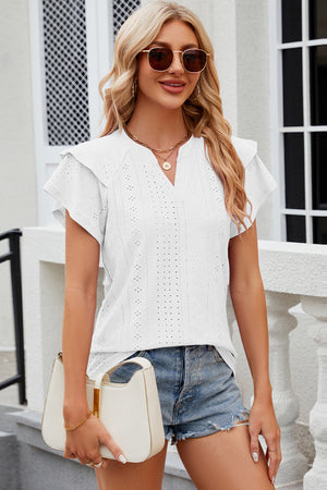 White eyelet flutter sleeve blouse with v-neck and ruffled sleeves.