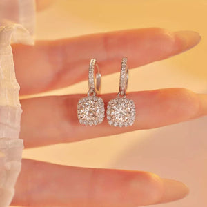 earrings in silver with halo setting and mini