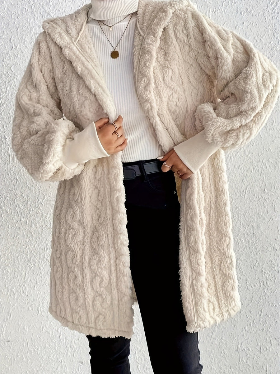 Beige hooded cocoon coat with textured cable knit, 100% polyester, open front.