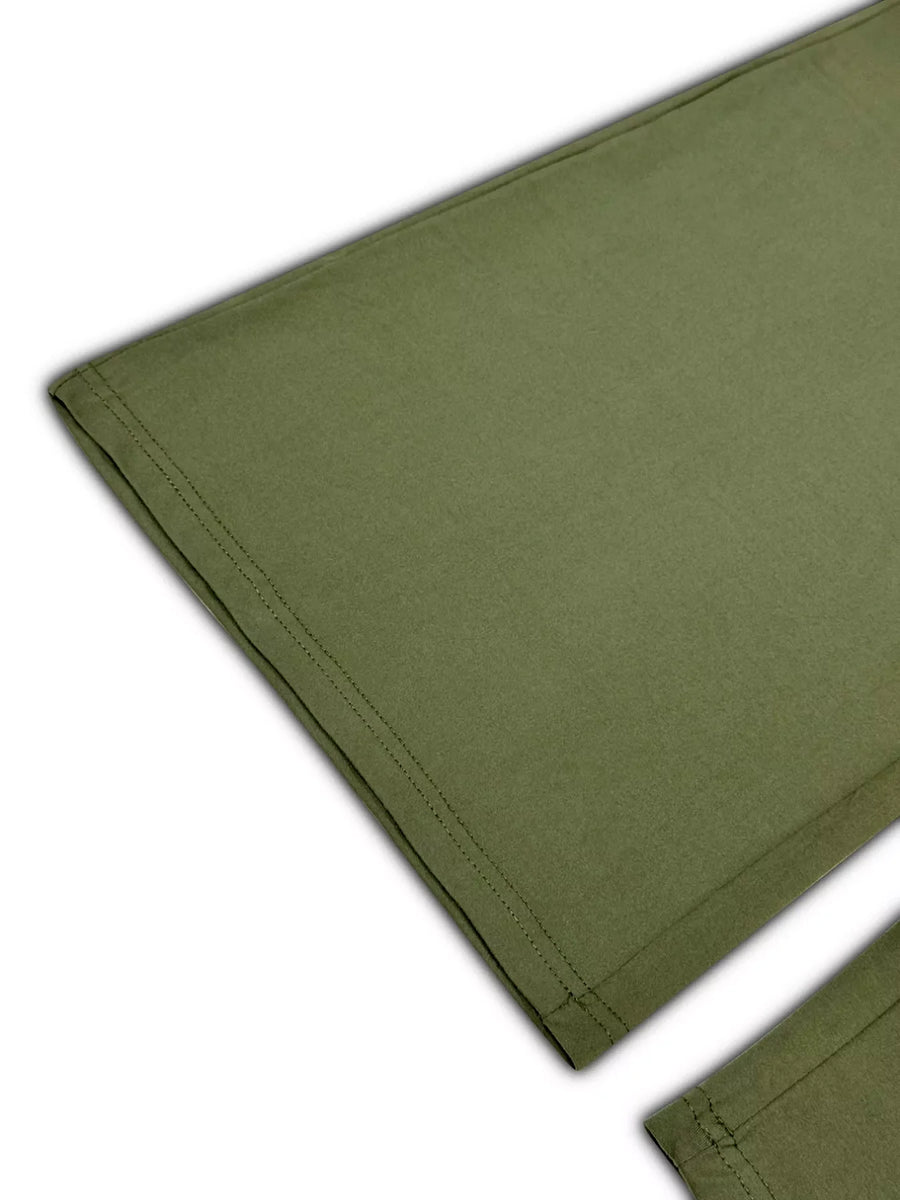 Moss green minimalist two-piece lounge set pants detail with double stitching.