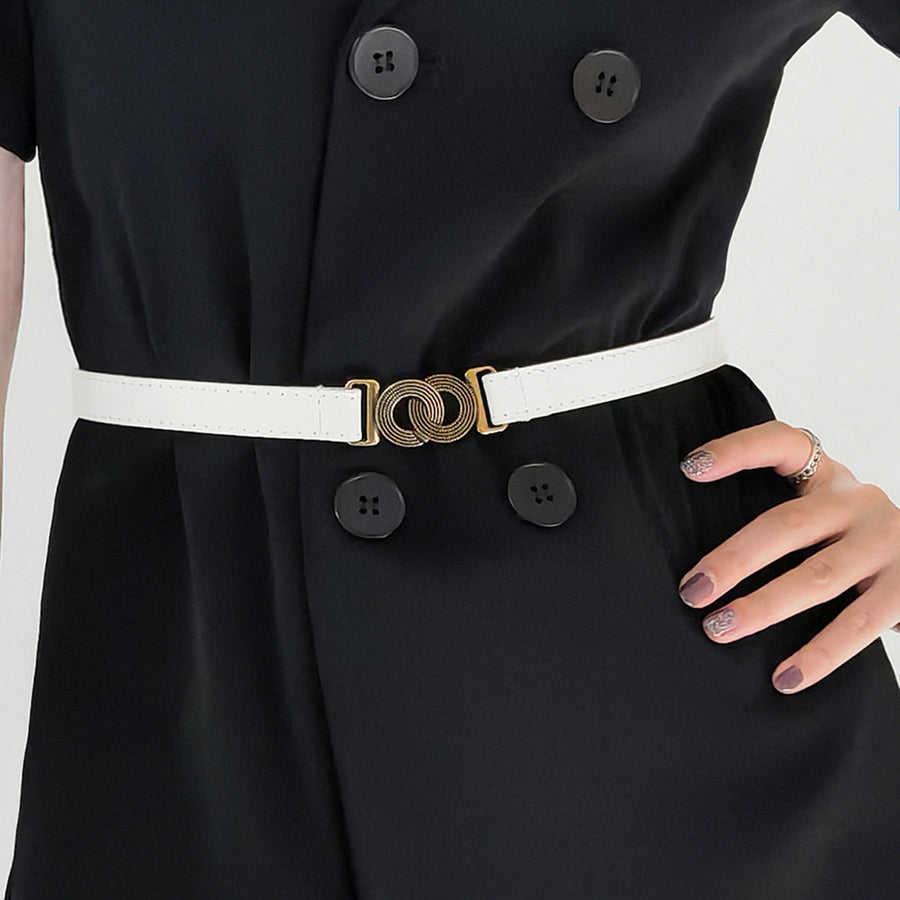 White vegan leather belt with interlocking gold buckle detail