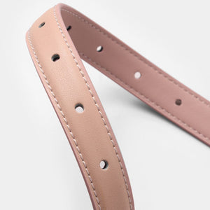 Sleek pink leather belt with multiple holes and white stitching detail.
