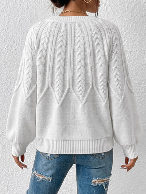 Camel pullover sweater featuring cable-knit and cable knit