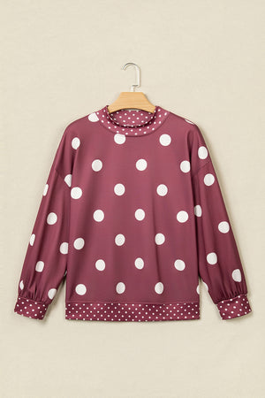 light pink sweatshirt featuring oversized and polka dot
