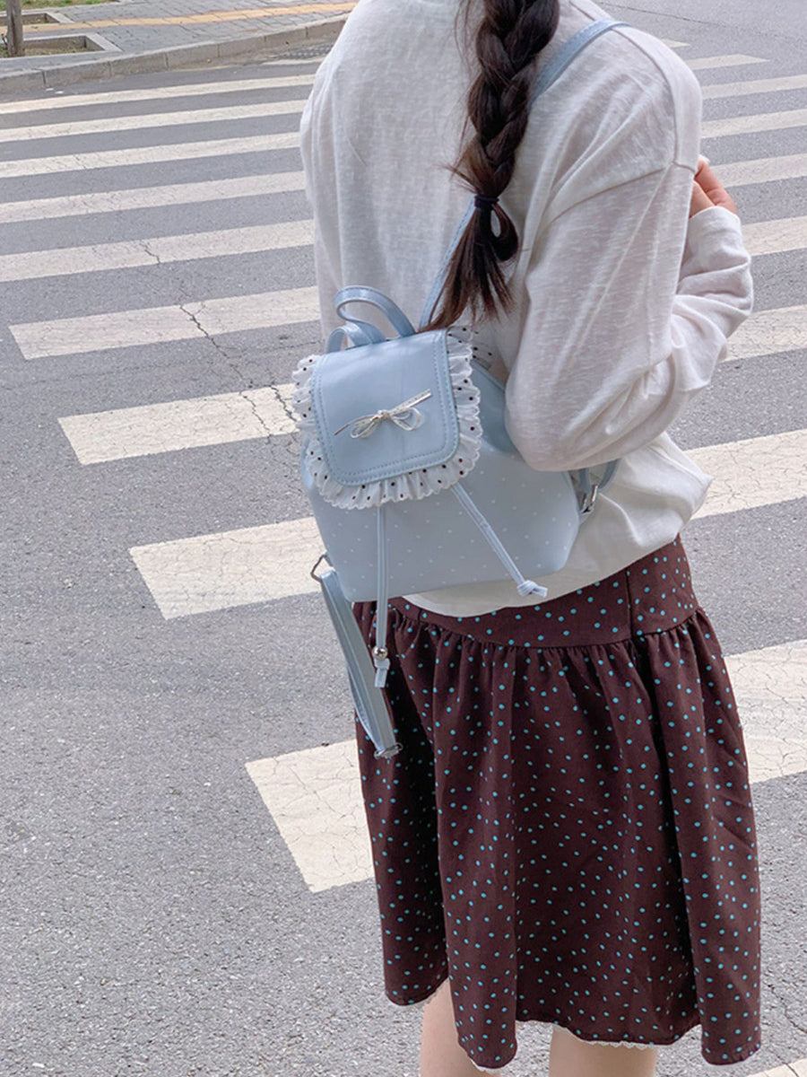 backpack featuring polka-dot in white with PU Leather Imported Size & texture