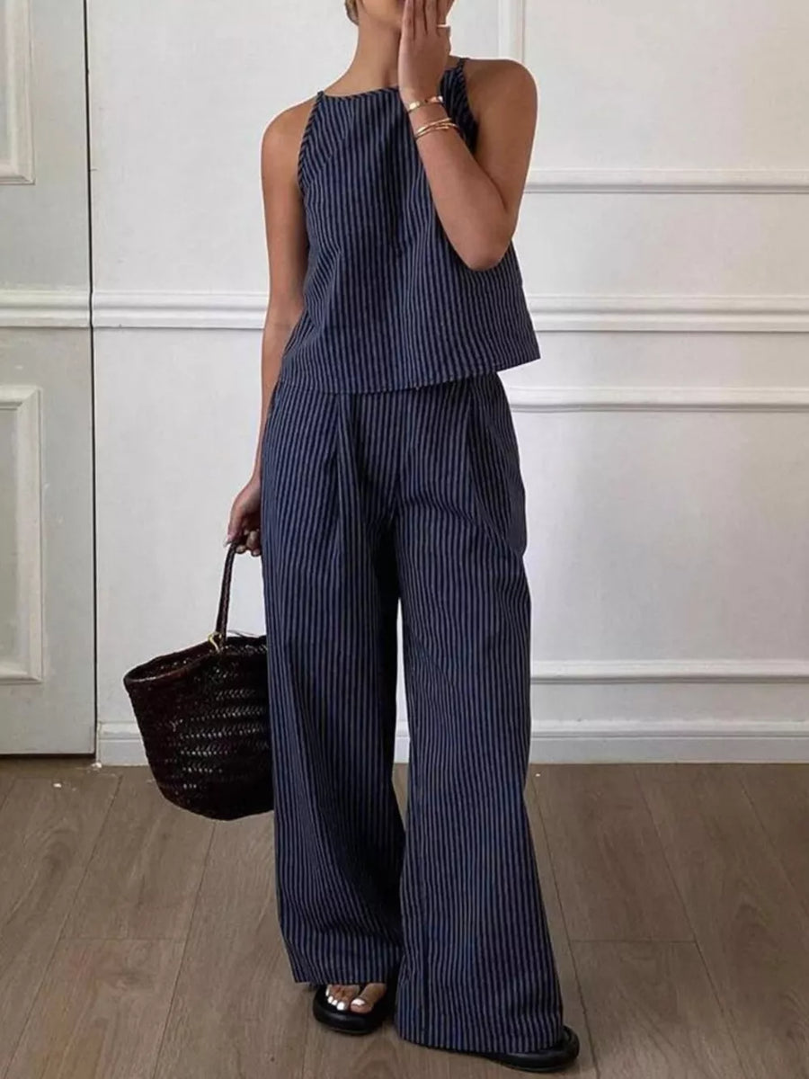 Blue striped sleeveless top and wide-leg pants set with a high neckline.