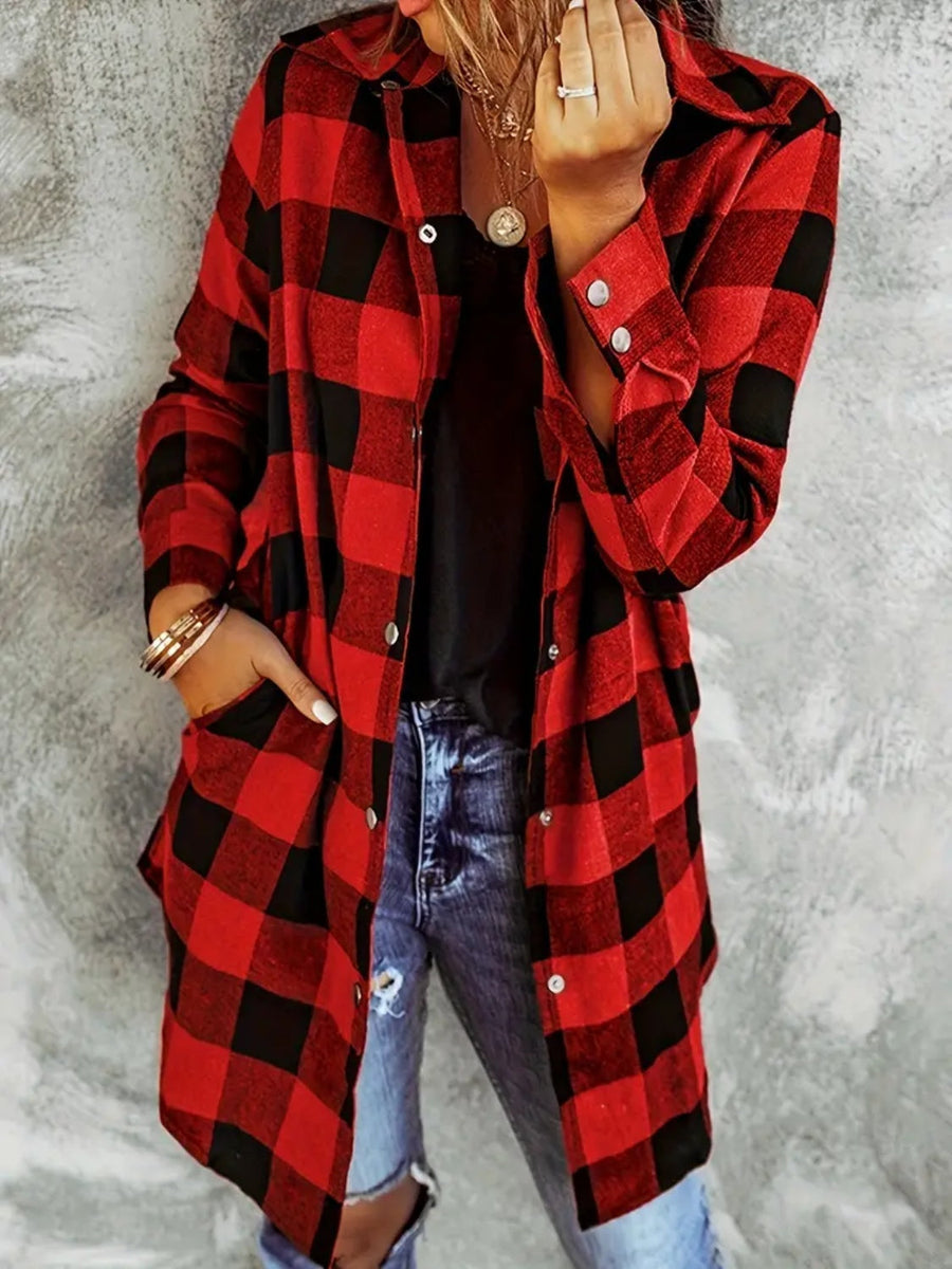 Oversized red and black buffalo check shirt jacket with button front and pockets.