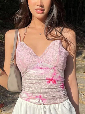Pink lace-trimmed camisole with leopard print and floral accents, V-neck, ruched sides.