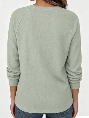 White henley with hip-length and half-button