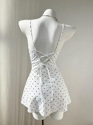White mini dress with button-front and polka dot