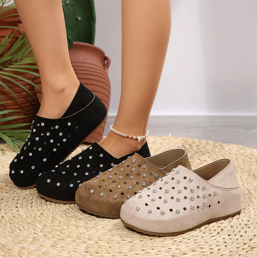 slip-ons in black featuring rhinestone embellishment and flats fit