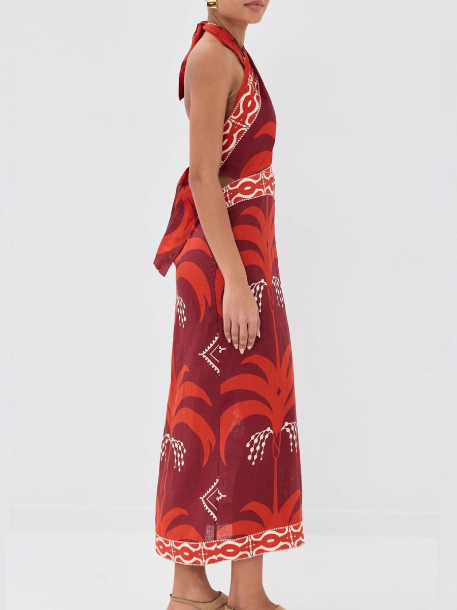 Tropical print halter neck maxi dress with cutout detail and tie back.