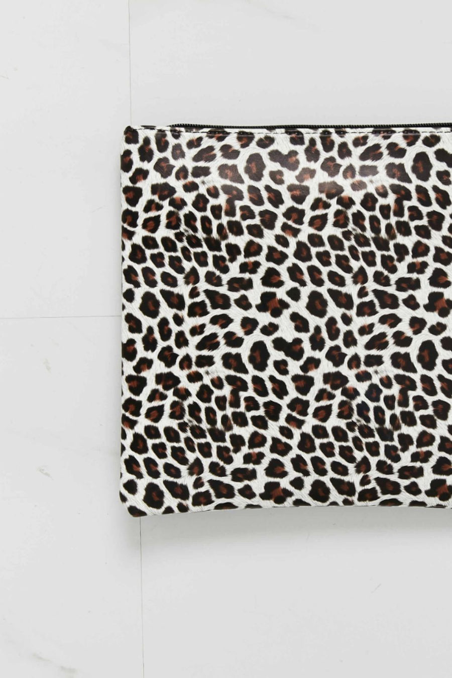 Leopard print wristlet pouch with zipper closure