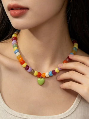 red necklace featuring heart-shaped beads and heart