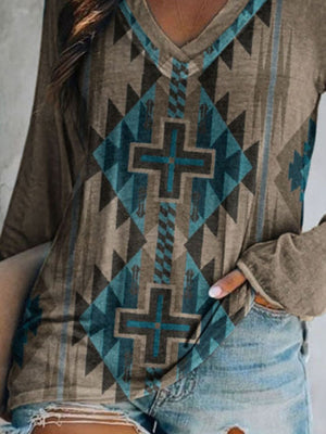 Geometric V-neck long sleeve t-shirt in grey with a colorful tribal pattern and cross motif.