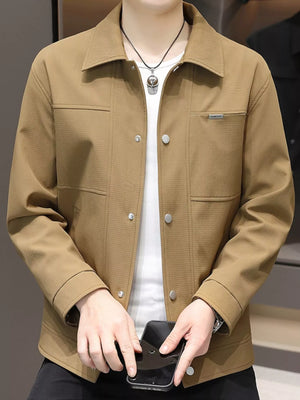 Men's caramel snap down jacket with textured fabric and chest pocket detail.