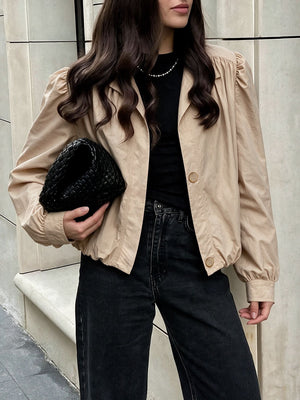 100% polyamide Care instructions: Machine wash cold jacket in tan with relaxed silhouette