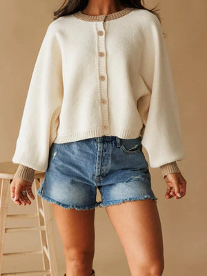 cardigan in ivory featuring ribbed and relaxed fit