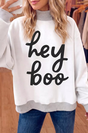 white sweatshirt with exposed seam and long sleeve