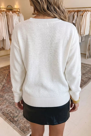 White pullover sweater with hip-length and pullover