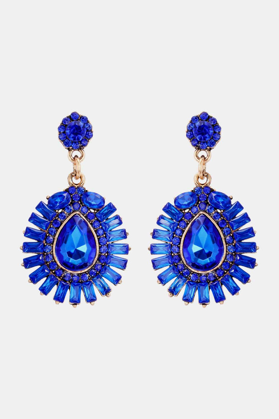 Royal blue dangle earrings with teardrop and baguette gemstones.