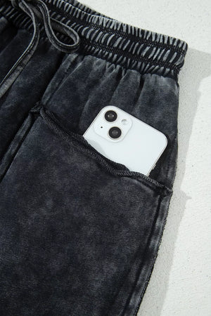 charcoal gray relaxed barrel pants with N/A