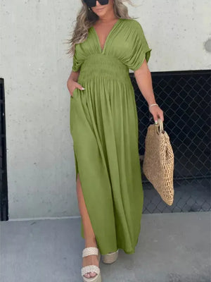 Matcha green V-neck dolman sleeve maxi dress with smocked waist and side slits.