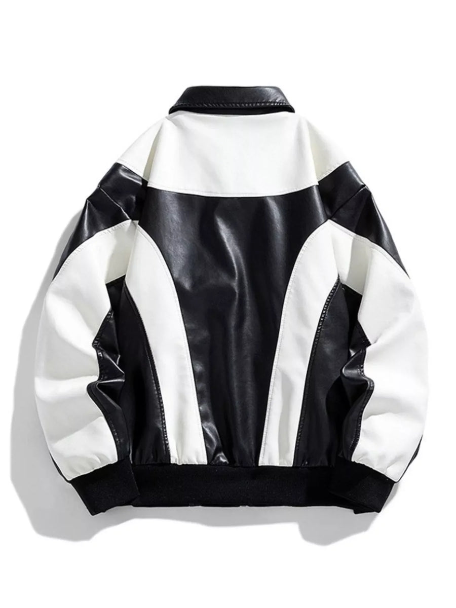 Retro bomber jacket in black and white faux leather with colorblock design and ribbed cuffs.