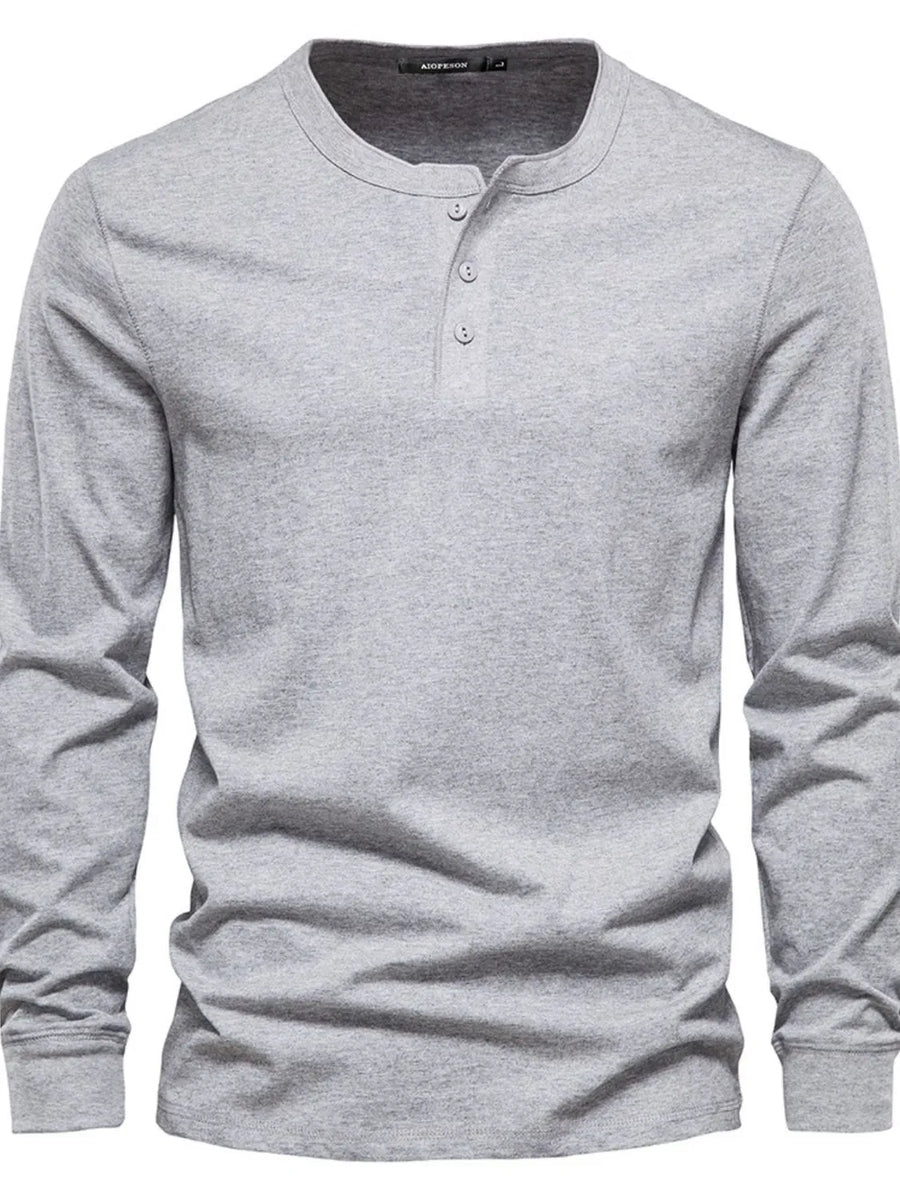 Gray Henley knit long sleeve tee with button placket and crew neck.