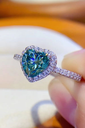 Green heart-cut moissanite halo ring with diamond band