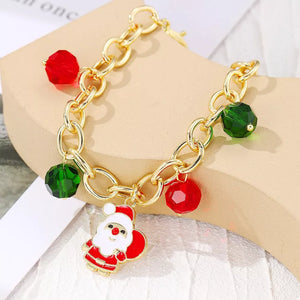 gold bracelet with figural and n/a