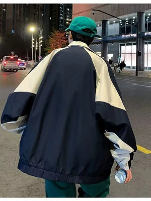 Plus-size two-tone windbreaker jacket in navy and cream with a relaxed fit.