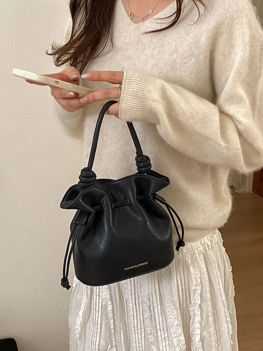 Drawstring Bucket Crossbody Bag in Black