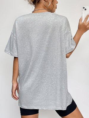 Grey graphic t-shirt with crew neck and short sleeves.