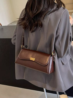 shoulder bag in Coffee with flap closure and small