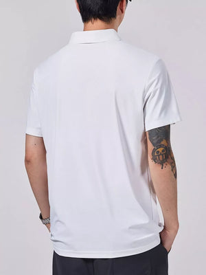 White short-sleeve cotton polo shirt with button detail, shown from the back.