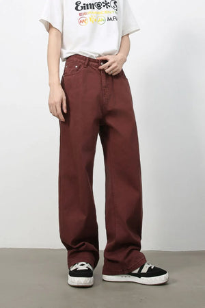 Burgundy wide-leg denim trousers with a casual, baggy fit.