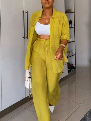 Lemon yellow tie-front collared button-down shirt and wide-leg pants ensemble with white crop top.