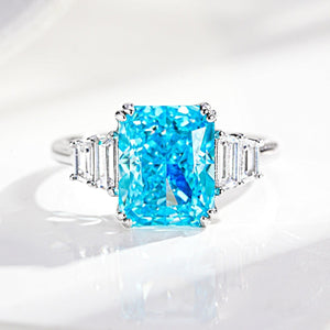 aqua blue ring featuring zircon stones and geometric