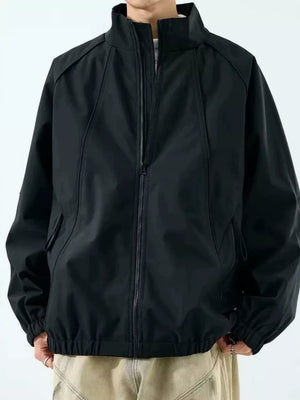 windbreaker in black featuring pocketed and relaxed fit