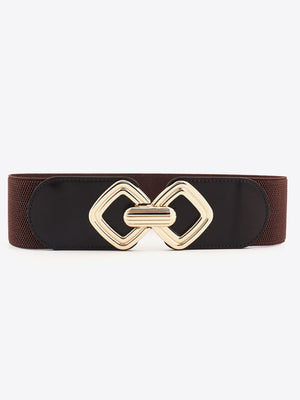 Elasticated waist belt in brown with black PU and a gold geometric buckle.