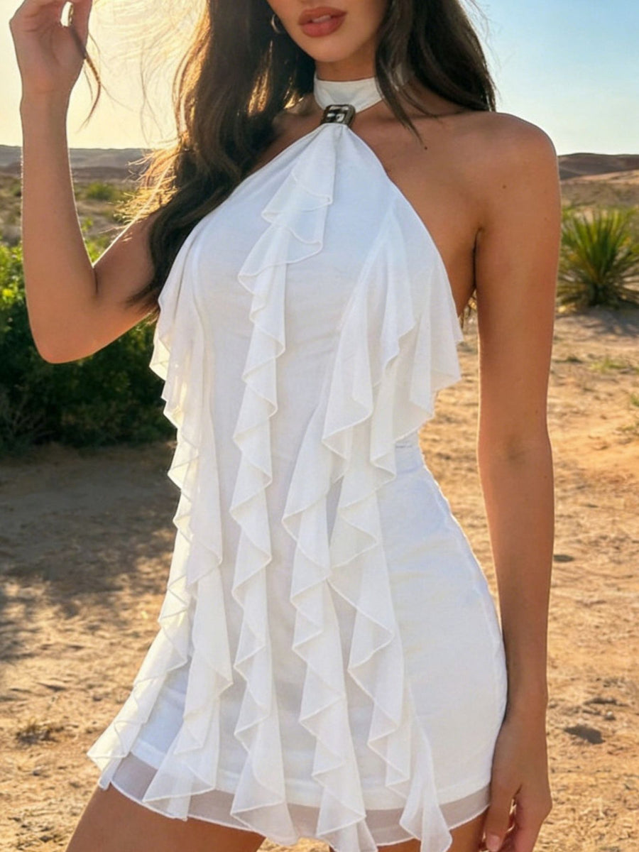 White halter choker mini dress with cascading ruffles and a gold buckle detail.