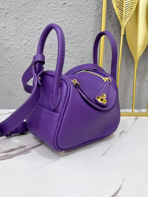 Peacock Green with crossbody bag with gold-tone hardware