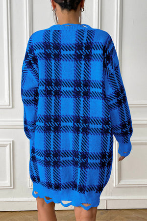 Royal blue plaid knit mini dress with distressed hem and long sleeves.